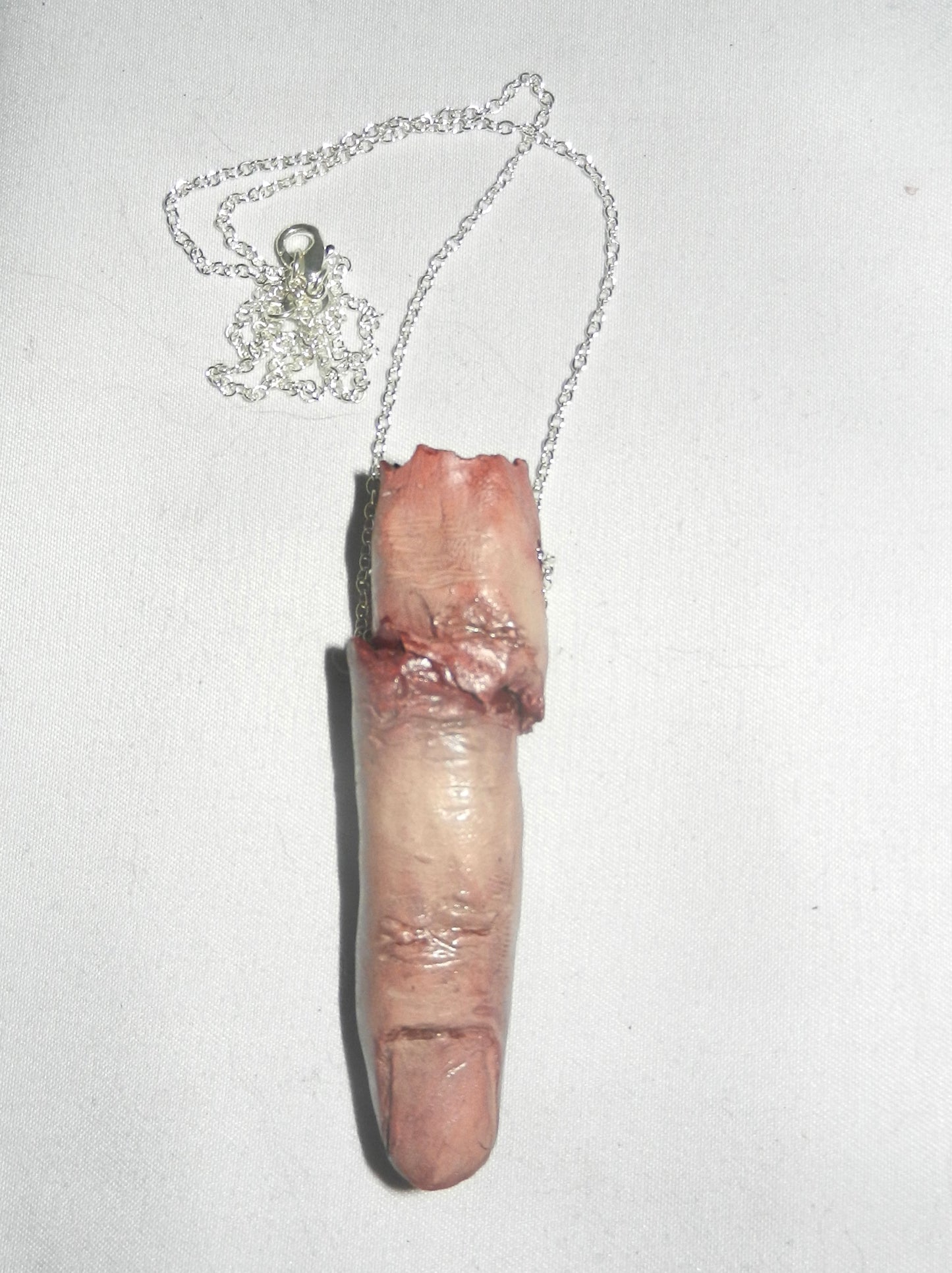 1/1 sliced finger necklace