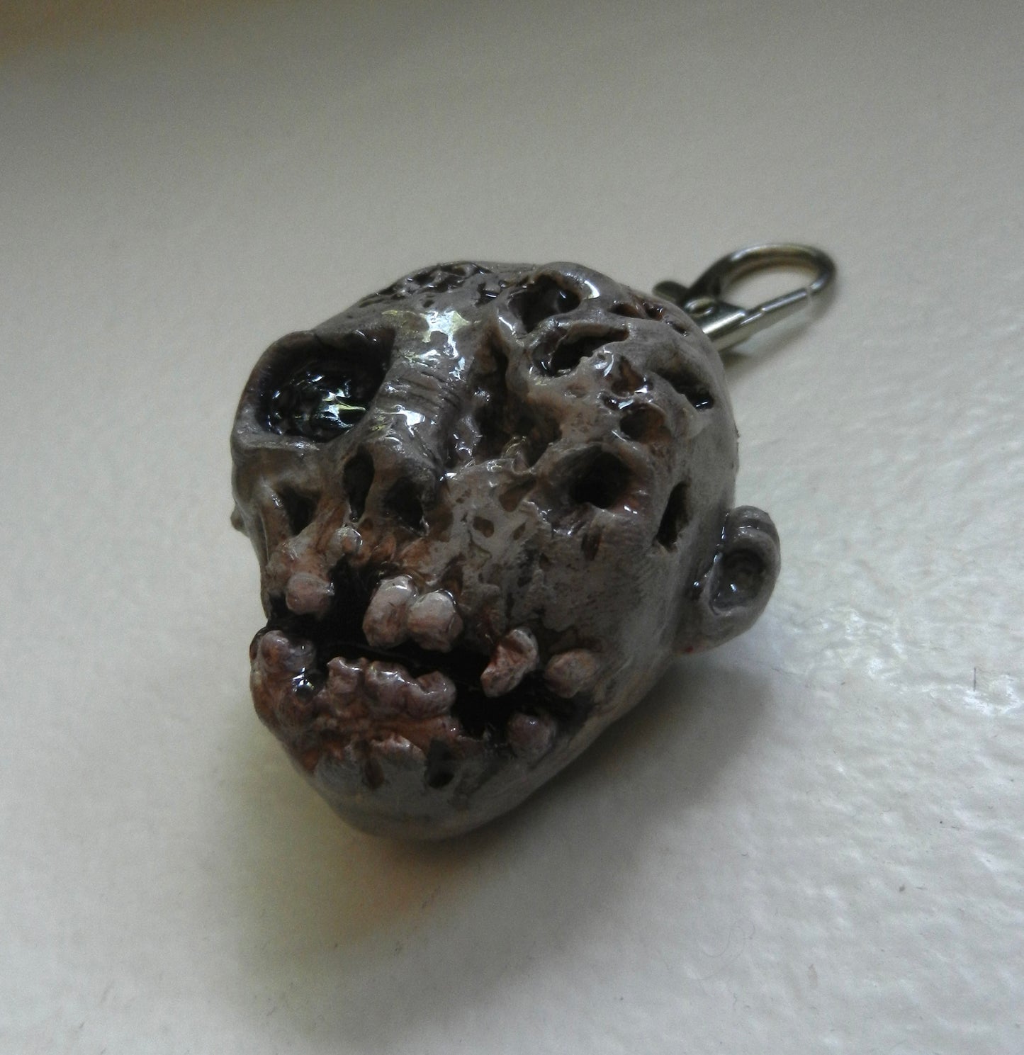 1/1 zombie keychain