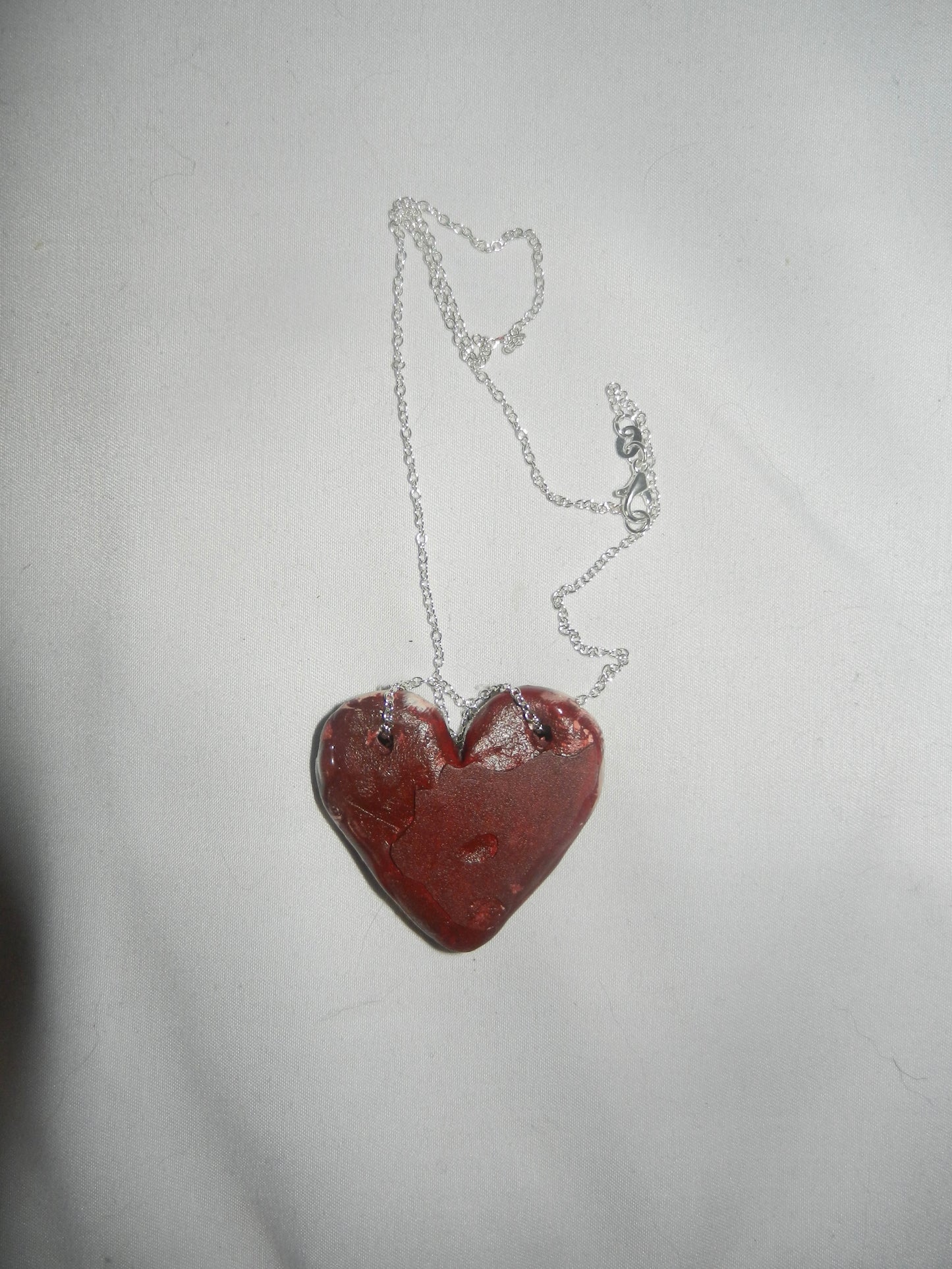 1/1 meat heart necklace