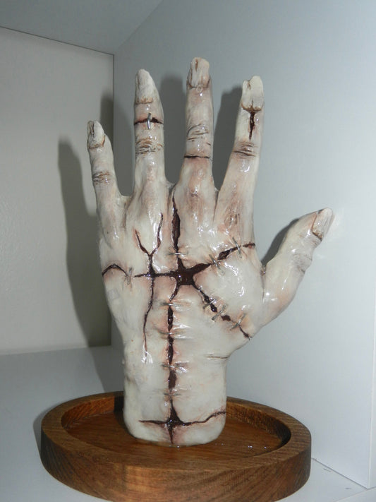 1/1 stitched hand ring holder
