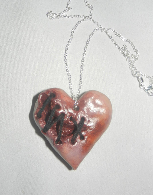 1/1 stitched heart necklace