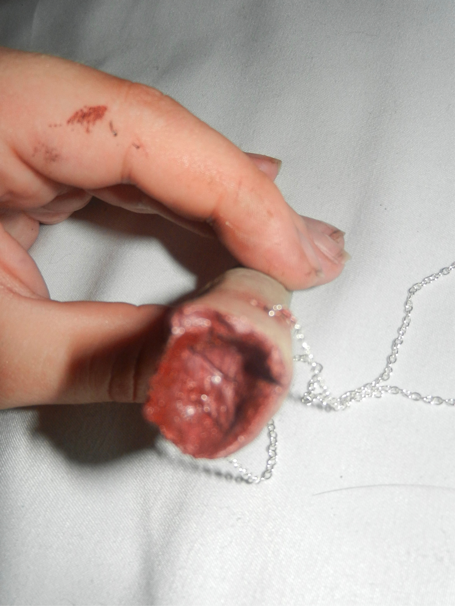 1/1 zombie severed finger necklace
