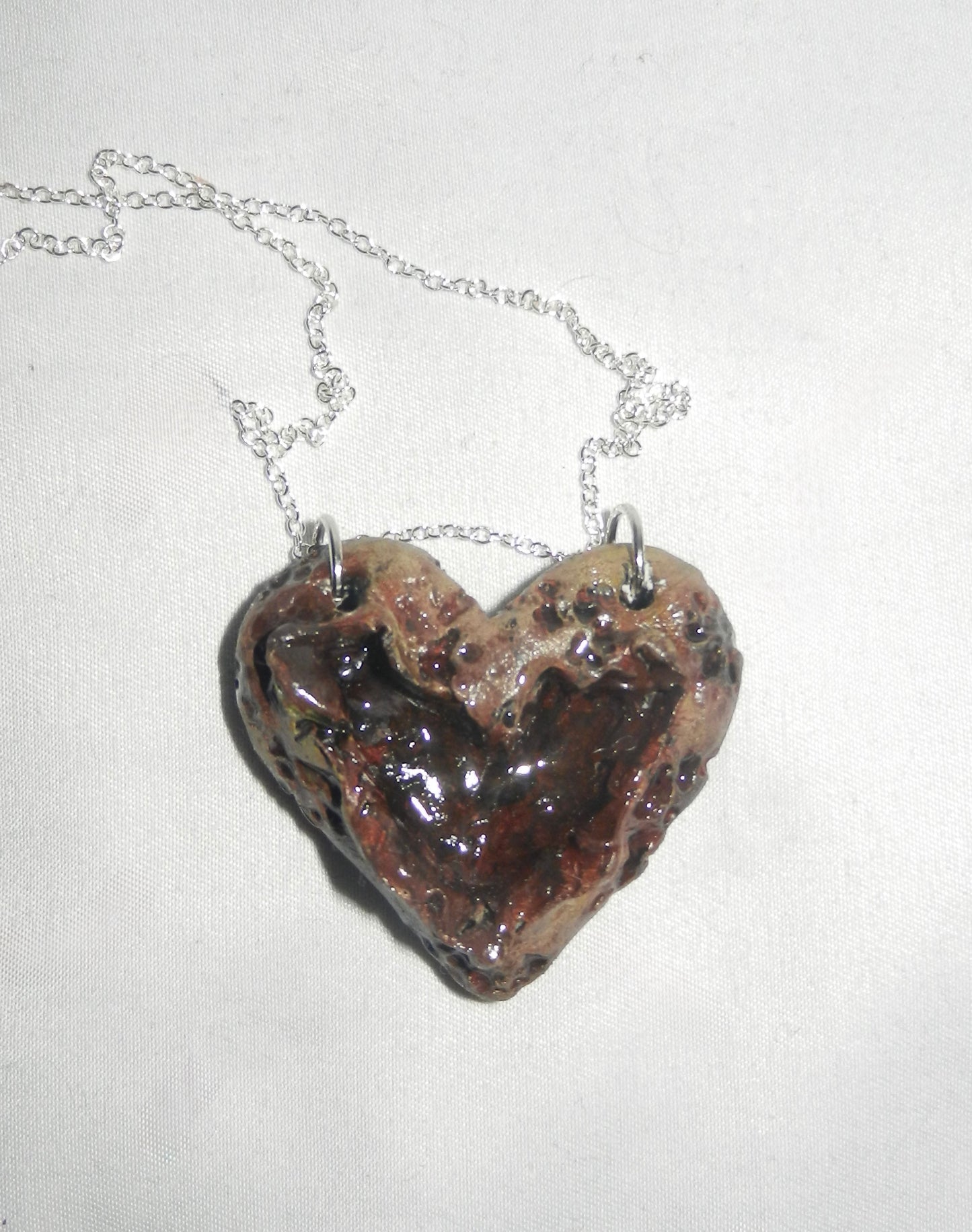 1/1 zombie heart necklace
