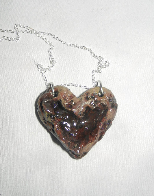 1/1 zombie heart necklace