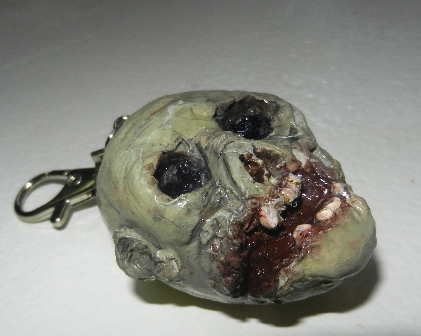 1/1 zombie keychain