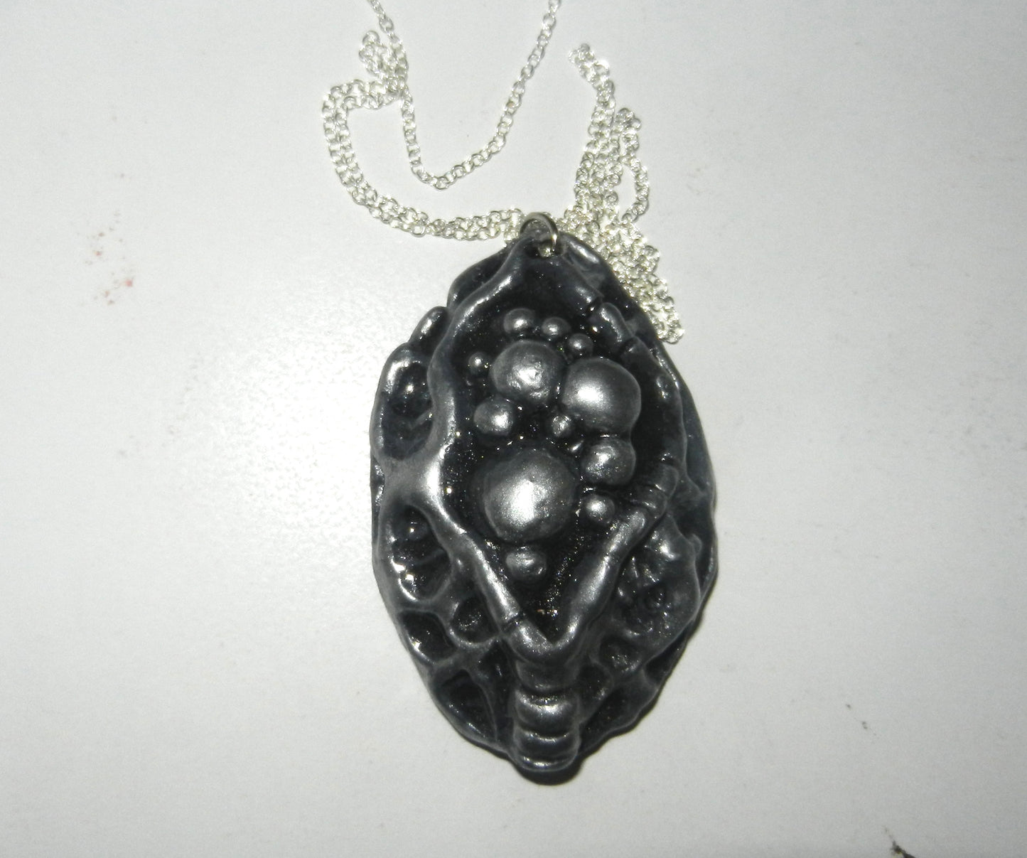 1/1 pus chamber necklace