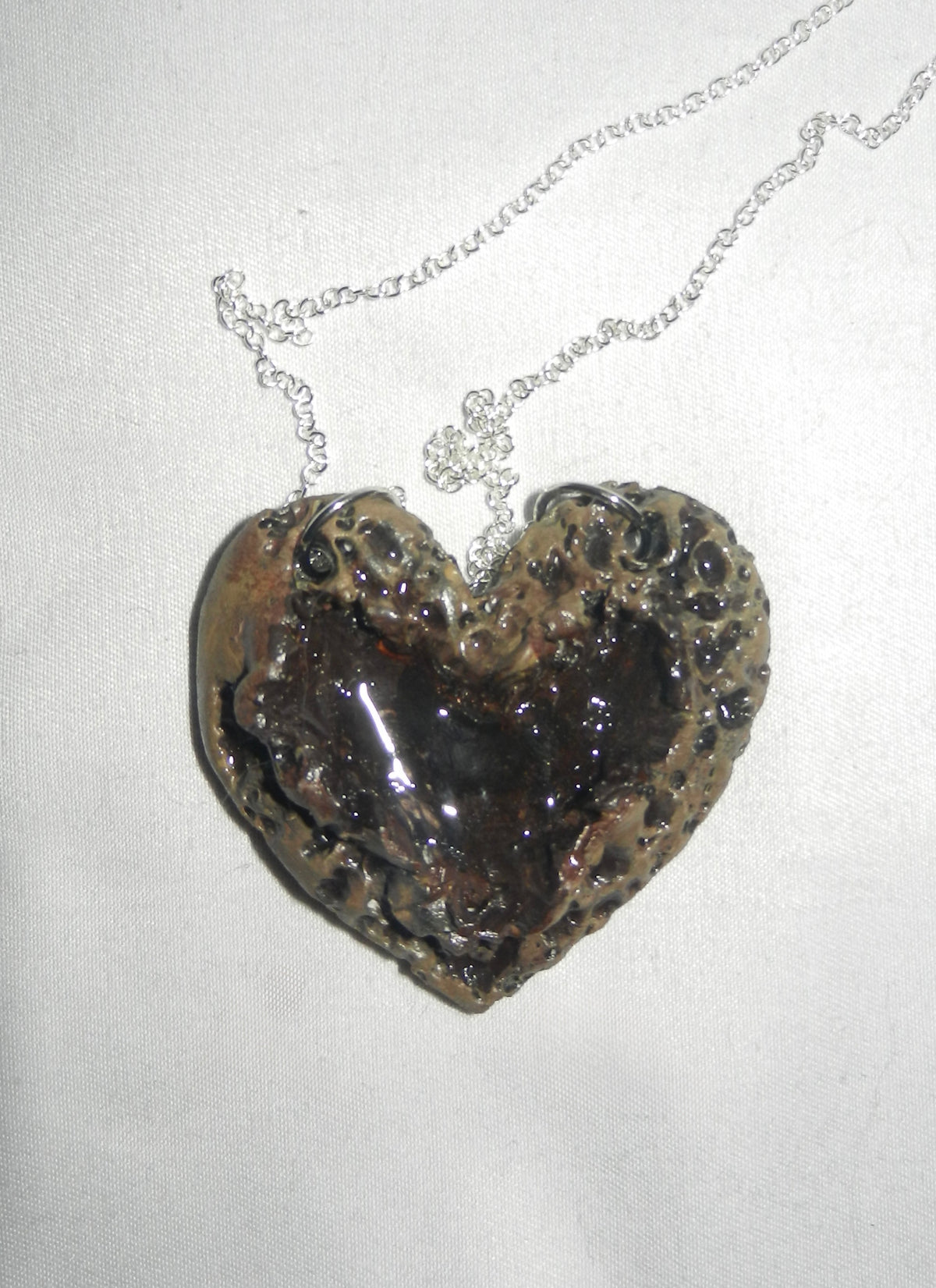 1/1 zombie heart necklace