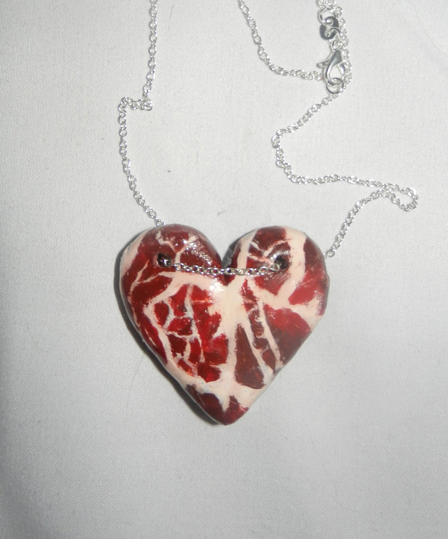 1/1 meat heart necklace