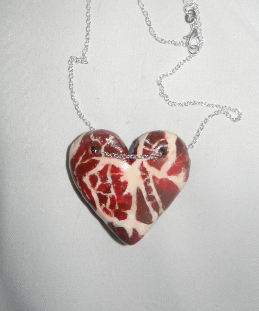 1/1 meat heart necklace