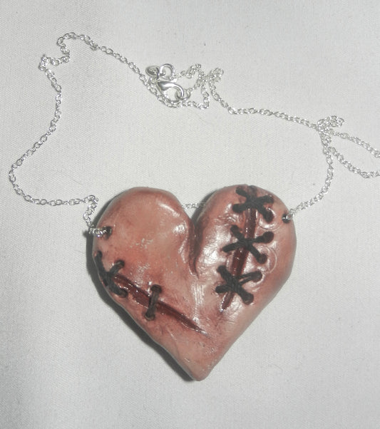 1/1 stitched heart necklace