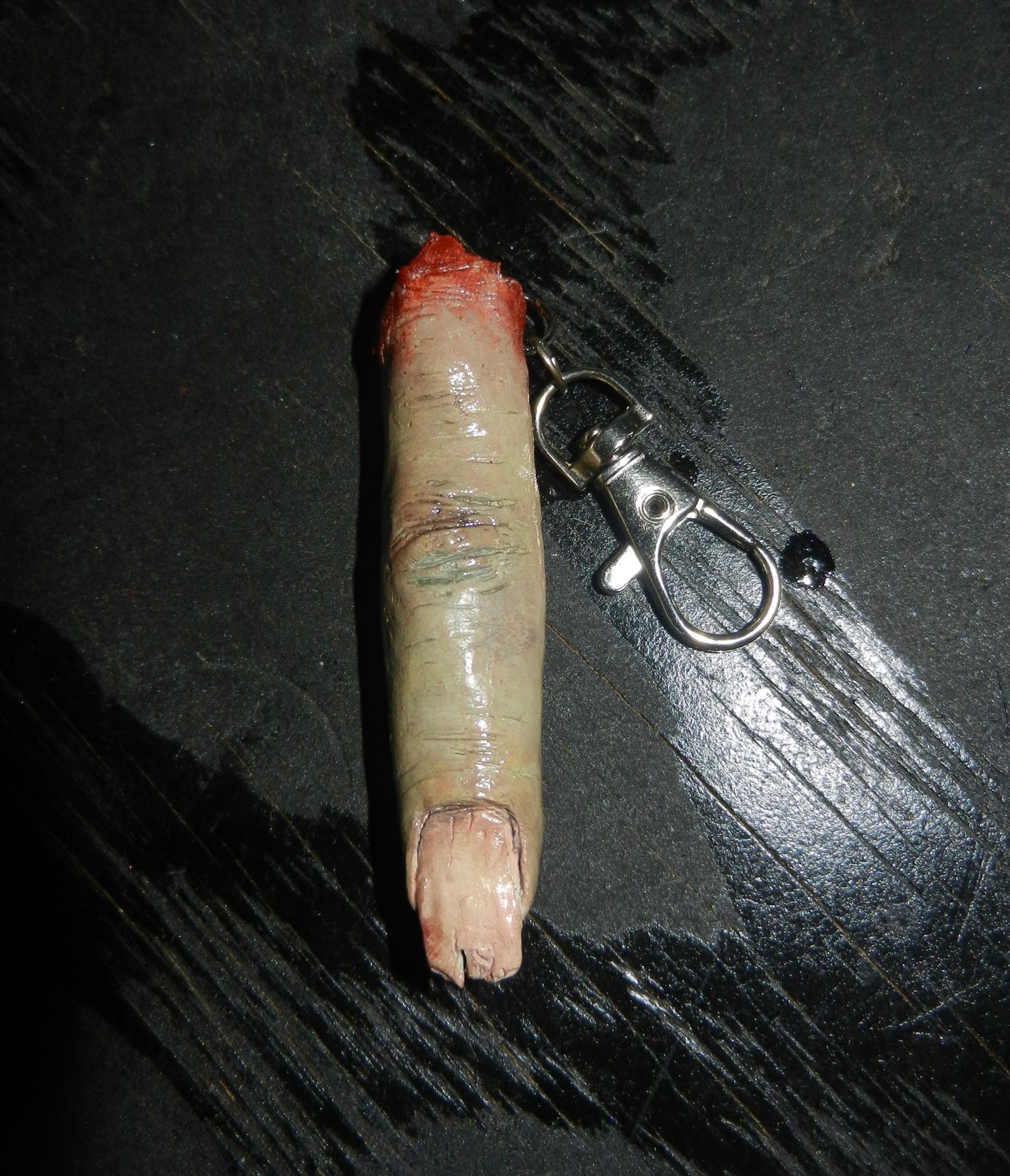 1/1 zombie finger keychain