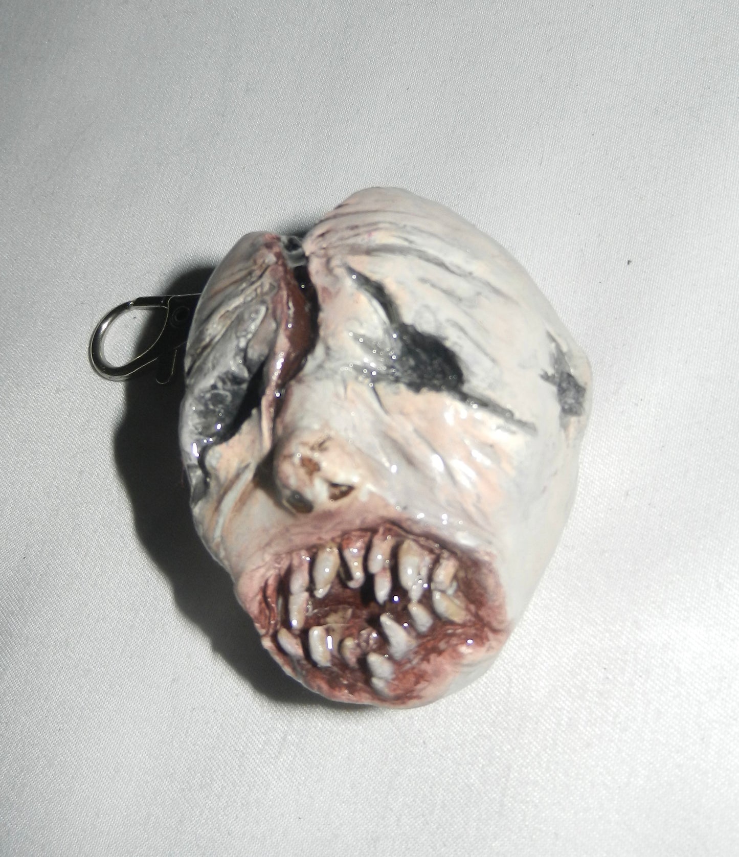 1/1 zombie keychain