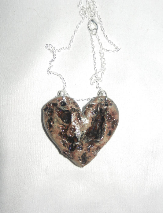 1/1 zombie heart necklace